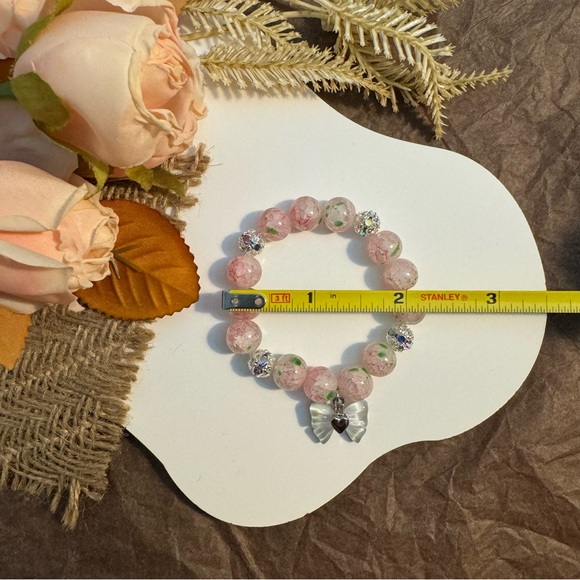 Baby Pink Beaded Bracelet with Bow Charm - Picture 5 of 5